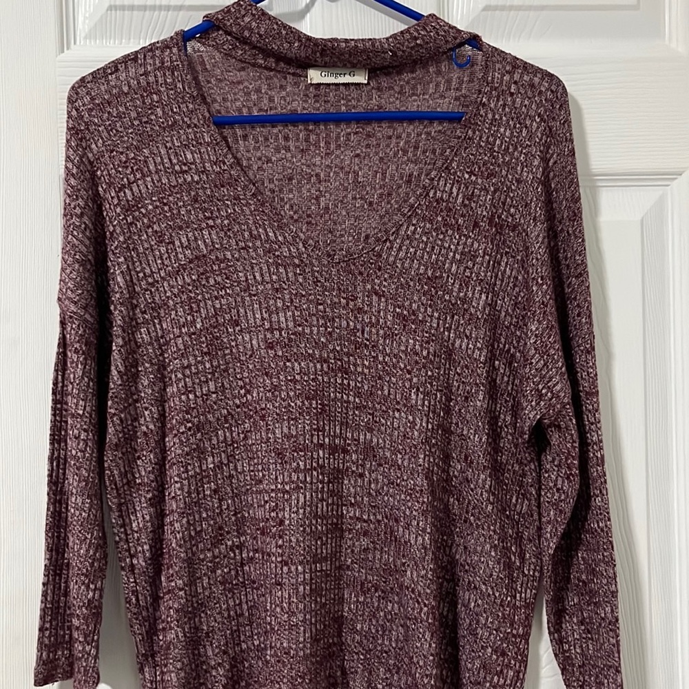 This is a ginger g shirt that is a medium and is purple